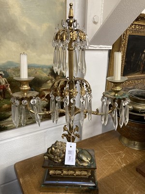 Lot 543 - Candelabras. A set of three gilt metal and bronze chandelier candelabras