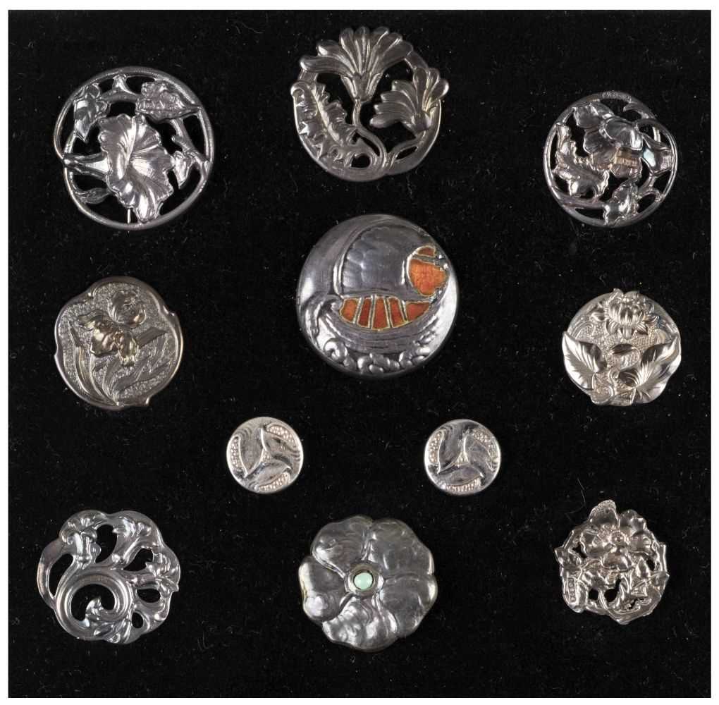 Lot 641 - Art Nouveau Silver Buttons.  'Cymric' silver button by Liberty & Co and other buttons