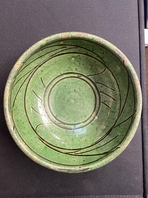 Lot 527 - Finch (Ray, 1914-2012) for Winchcombe Pottery. A green pottery bowl