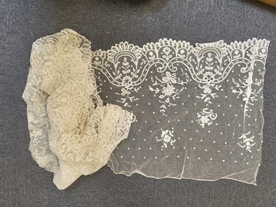 Lot 761 - Lace. Four large flounces, 19th century, & other lace