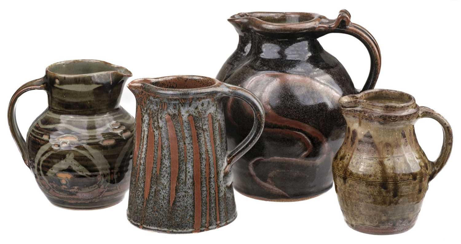 Lot 538 - Studio Pottery. A collection of jugs, including a stoneware jug by Mike Dodd (1943 -)