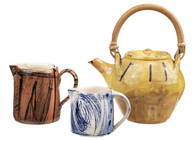 Lot 529 - Garland (David, 1941 -). A terracotta earthenware teapot with cane handle, 2009