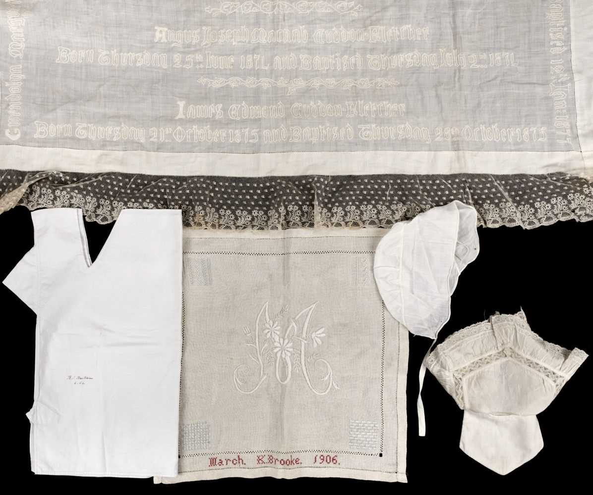 Lot 744 - Infants' Items. An embroidery commemorating births in the Cuddon-Fletcher family, 1870s, & clothing