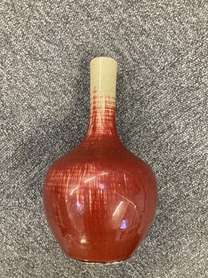 Lot 612 - Vase. A Chinese sang de boeuf porcelain bottle vase, 18/19th century