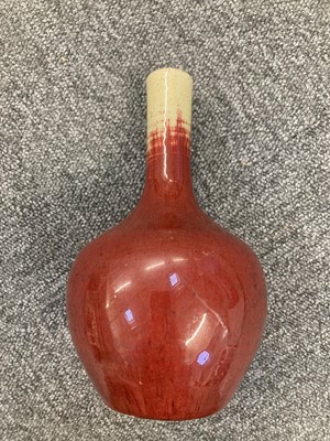 Lot 612 - Vase. A Chinese sang de boeuf porcelain bottle vase, 18/19th century