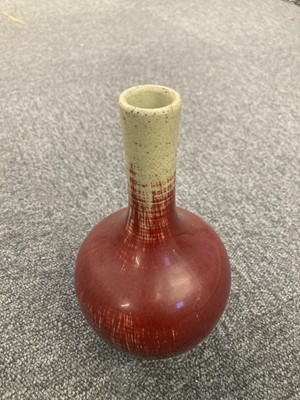 Lot 612 - Vase. A Chinese sang de boeuf porcelain bottle vase, 18/19th century