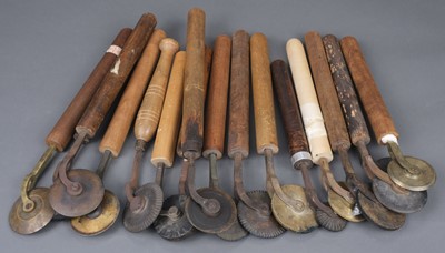 Lot 209 - Decorative rolls & fillets. A collection of 9 decorative rolls and 7 fillets, and 1 farthing wheel