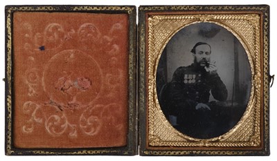 Lot 207 - Military Photograph. A Victorian sixth-plate ambrotype of a Crimean War veteran, circa 1860