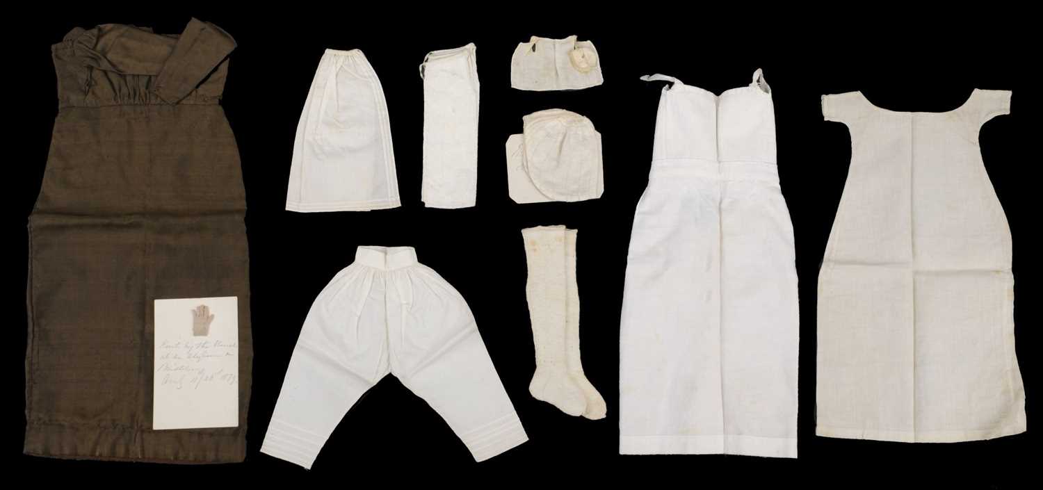 Lot 442 - Miniature Clothing. A Hollie point lace doll'