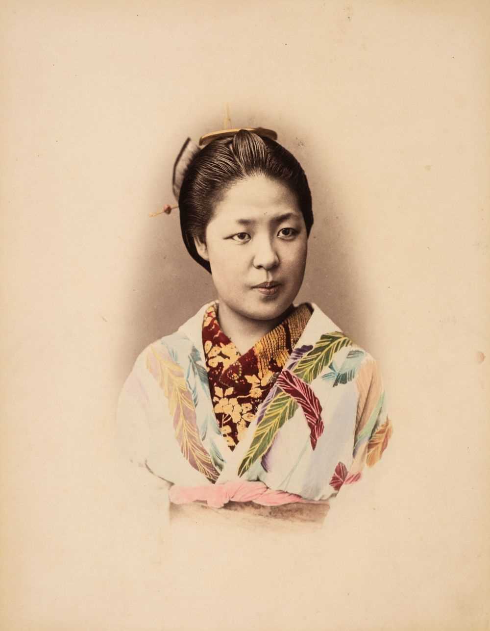 Lot 114 - Japan. Vignetted headshot of a Japanese woman in traditional dress, c. 1880