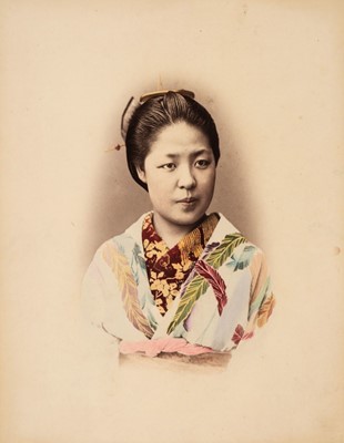 Lot 114 - Japan. Vignetted headshot of a Japanese woman in traditional dress, c. 1880