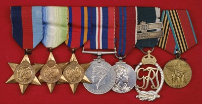 Lot 105 - WWII Medals. Seven: Commander J.D.E. Lewis, Royal Naval Reserve