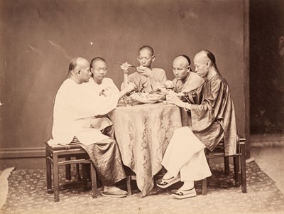 Lot 60 - China. Chinese Merchants [and] Chinese people about to eat, both by Pun Lun, c. 1870