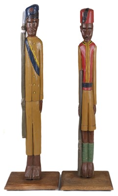 Lot 114 - Wooden Soldiers. A pair of African wooden soldiers