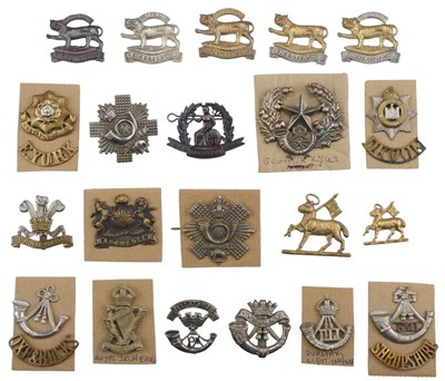 Lot 246 - Cap Badges. A collection of regimental cap badges