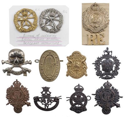 Lot 245 - Cap Badges. A collection of military cap badges