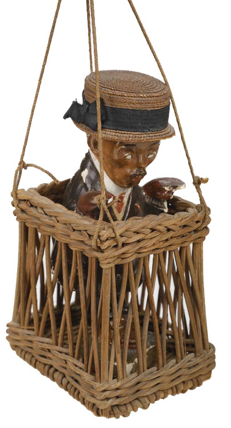 Lot 531 - Santos-Dumont (Alberto, 1873-1932). A novelty painted plaster figure of Santos-Dumont circa 1910