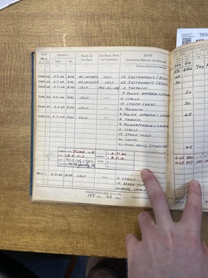 Lot 452 - Log Book. WWII Royal Canadian Air Force log book kept by Flying Officer D.H. Shorland