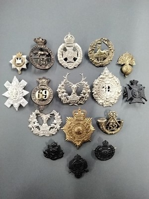 Lot 247 - Cap Badges. A collection of Victorian and later cap badges