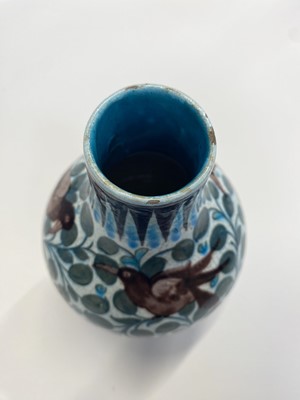 Lot 444 - De Morgan (William, 1839-1917). An early Fulham period Persian ovoid pottery vase