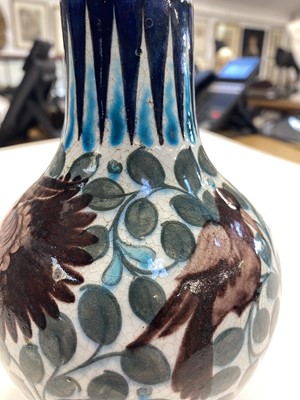 Lot 444 - De Morgan (William, 1839-1917). An early Fulham period Persian ovoid pottery vase