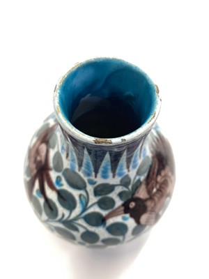 Lot 444 - De Morgan (William, 1839-1917). An early Fulham period Persian ovoid pottery vase