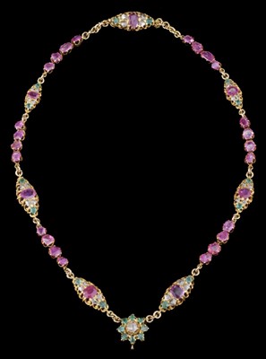 Lot 595 - Necklace. An Indian yellow metal necklace, set with diamonds, rubies and emeralds