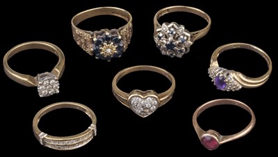 Lot 599 - Rings. Seven 9ct gold dress rings