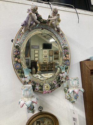 Lot 448 - Wall Mirrors. A pair of Dresden porcelain wall mirrors