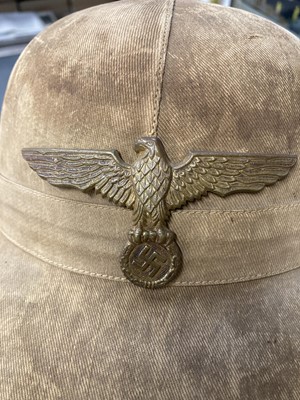 Lot 78 - Kriegsmarine. A WWII German pith helmet of the North Afrika Corps