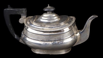 Lot 621 - Teapot. A George V heavy gauge silver teapot