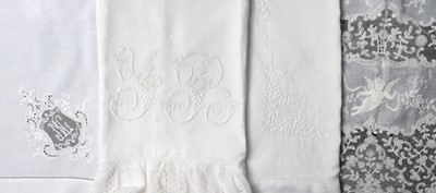 Lot 500 - Household Linen. A collection of napkins, tablecloths, pillowcases, and bedcovers, 19th/20th century