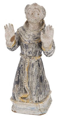 Lot 566 - Polychrome Figure. A Continental limewood figure of Saint Francis of Assisi