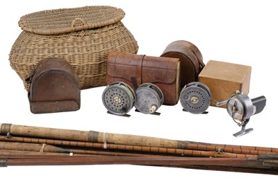 Lot 555 - Fishing. A collection of vintage fishing collectables