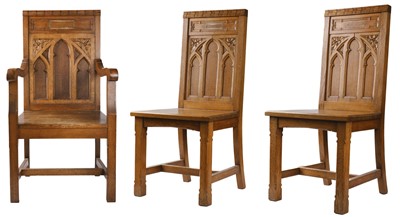 Lot 628 - Gothic Revival. Three carved oak chairs