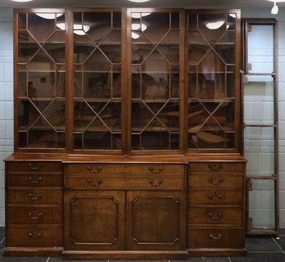 Lot 625 - Bookcase. A George III period mahogany breakfront bookcase