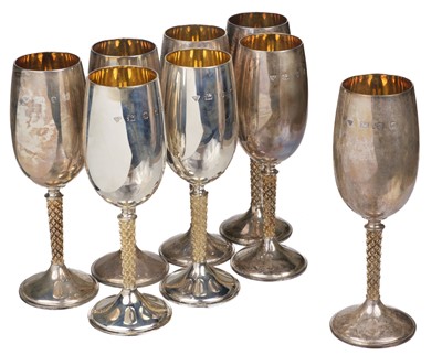 Lot 504 - Goblets. A set of 8 silver goblets designed by Anthony Elson for Garrard & Co Ltd, London, 1975,1977