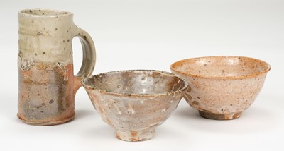 Lot 379 - Collins (Nic, 1958-). A tall wood fired stoneware tankard and two others pots