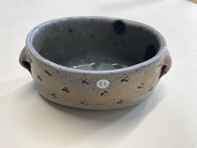 Lot 433 - Tudball (Ruthanne, 1948-). A faceted stoneware jar and cover and two other salt glazed pots