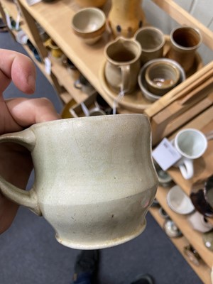 Lot 428 - Studio Pottery. A collection of nine mugs