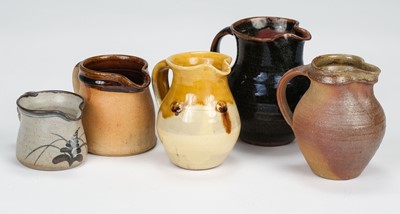 Lot 427 - Studio Pottery. A collection of jugs