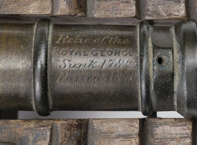 Lot 74 - H.M.S. Royal George. A model cannon with engraved barrel