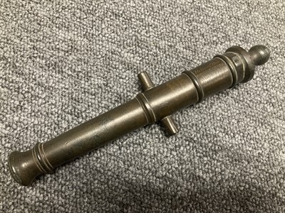 Lot 74 - H.M.S. Royal George. A model cannon with engraved barrel