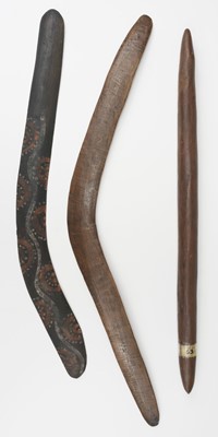 Lot 109 - Tribal Art. An Australian Aboriginal throwing club plus two boomerangs