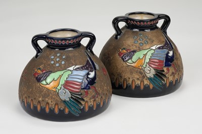 Lot 441 - Amphora Pottery. A matching pair of twin handled wide-bottomed Campina pattern vases