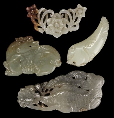 Lot 490 - Jade. A jade panel, carved as a carp catching a dragonfly and other pieces