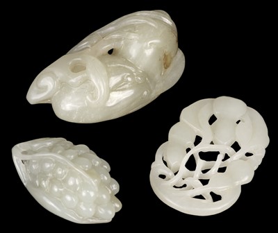 Lot 488 - Jade. A Chinese jade fruit, carved as berries and vine and other pieces