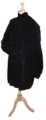 Lot 317 - Clothing. A black velvet opera coat, circa 1920s, & other clothing