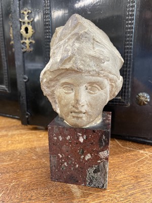 Lot 465 - Roman School. A Roman stone head of Athena, circa 2nd century AD