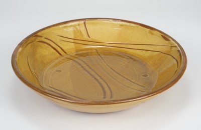 Lot 426 - Slipware. A very large earthenware dish